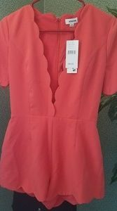 Wow them with this Statement persimmon Romper!